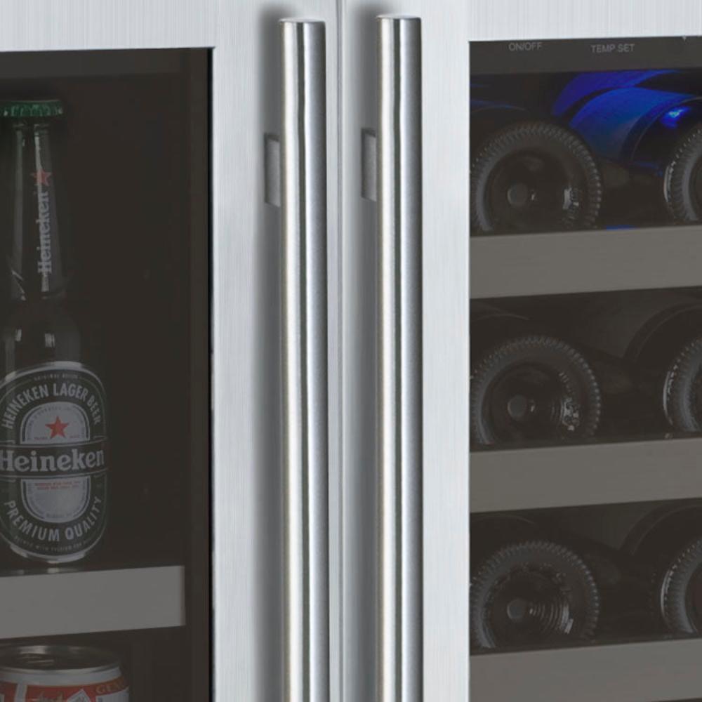 Stainless steel refrigerator with open door displaying bottles and cans.