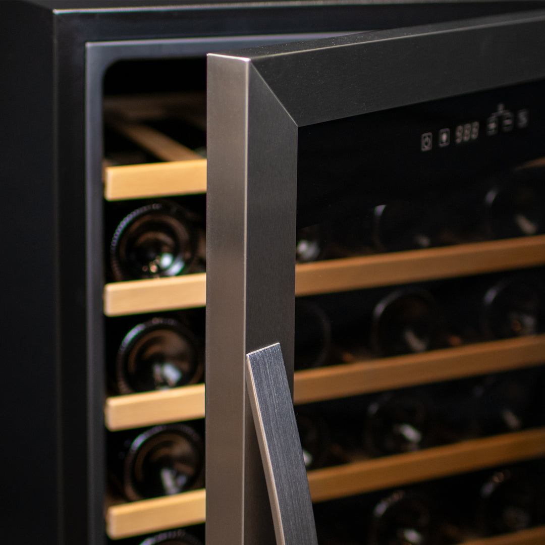Close-up of stainless steel framed UV-protective glass door on Allavino Cascina wine cooler, protecting the collection from light.