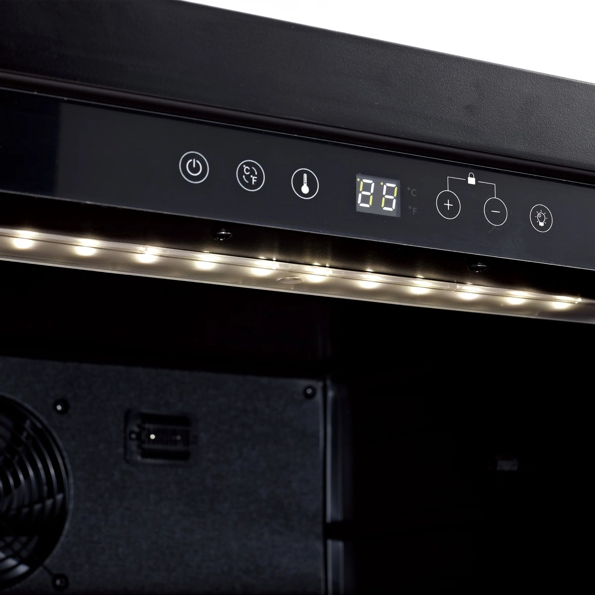 Control panel with illuminated buttons and display on a black appliance