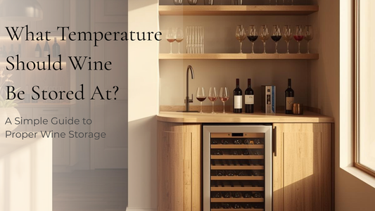 Modern home bar with built-in wine fridge and wine glasses illustrating ideal wine storage temperature.