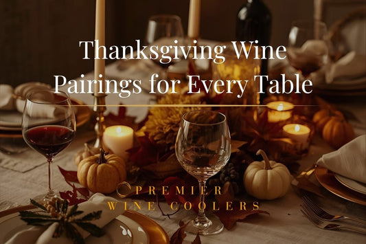 Elegant Thanksgiving table with wine glasses, candles, and fall accents in warm golden lighting