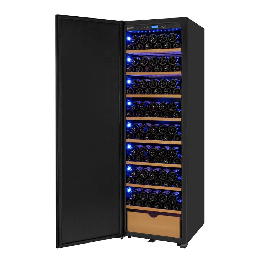 Freestanding tall black wine refrigerator in a luxury wine cellar