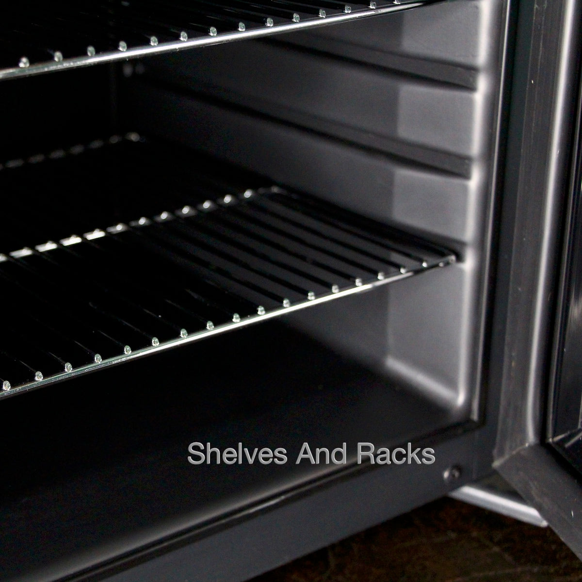 Close-up of the chromed metal shelves, displaying their sturdy construction and spacing for beer cans and beverages.