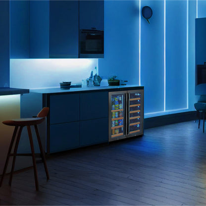 All-in-One Wine and Beverage Storage Center with dual cooling zones and a sleek stainless steel design shown lit up in modern kitchen