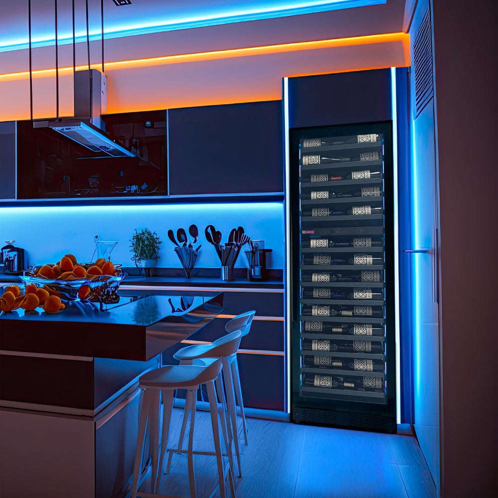 Modern kitchen with a Reserva Series black wine refrigerator displaying bottles, perfect for wine enthusiasts.