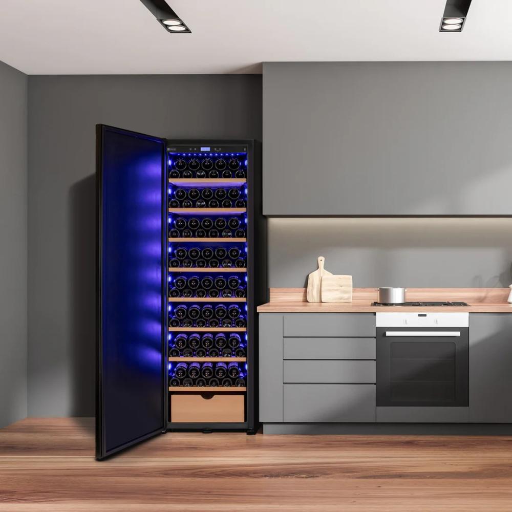 Wine cooler with open door in a modern kitchen setting