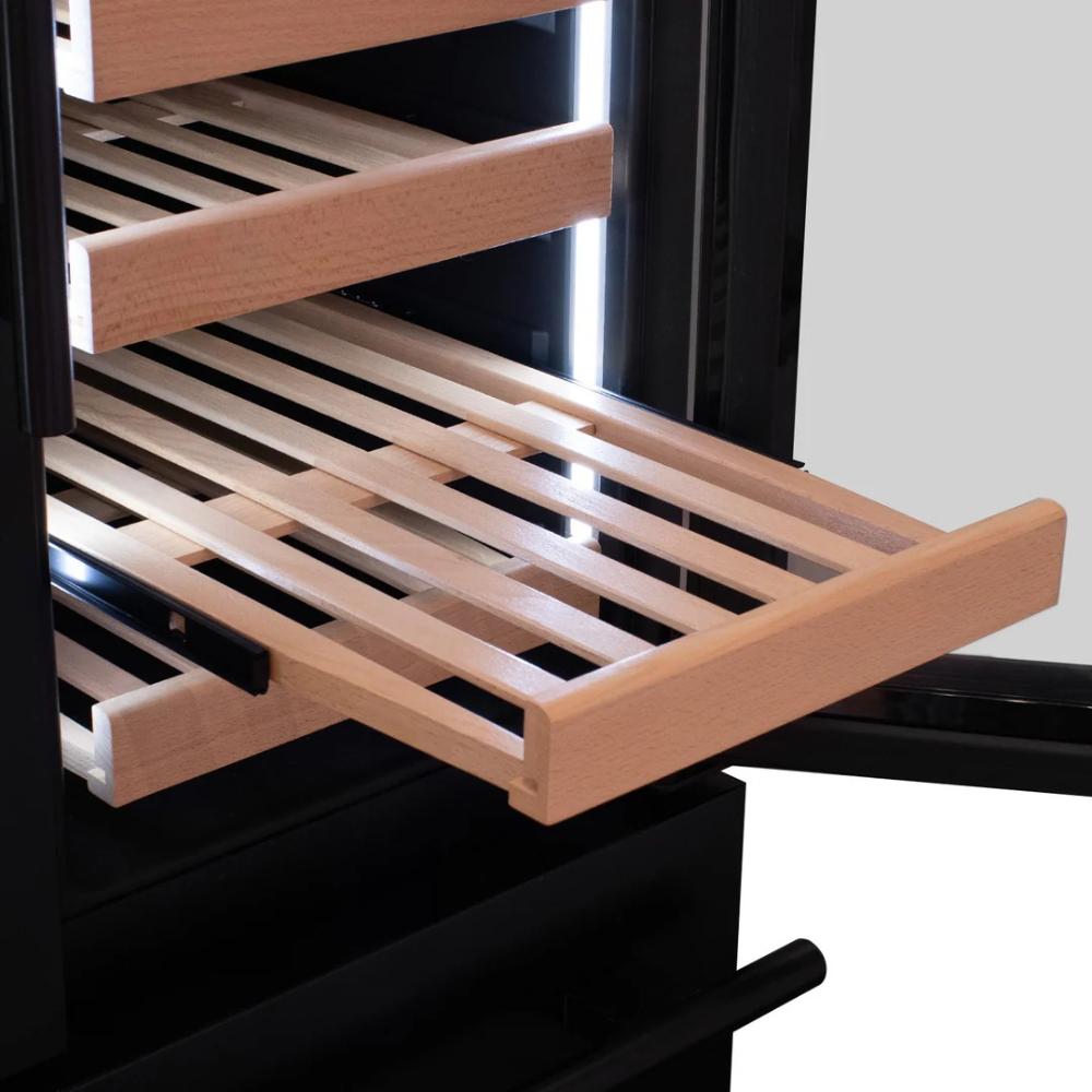 Wooden wine rack inside a black wine refrigerator.