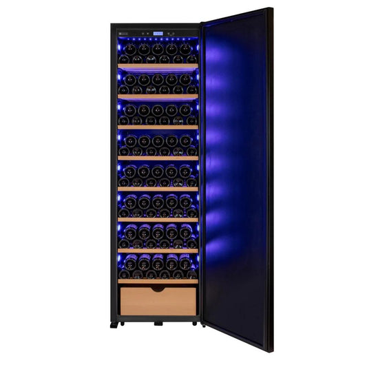 Wine cooler with solid black door with open door displaying rows of wine bottles on a white background