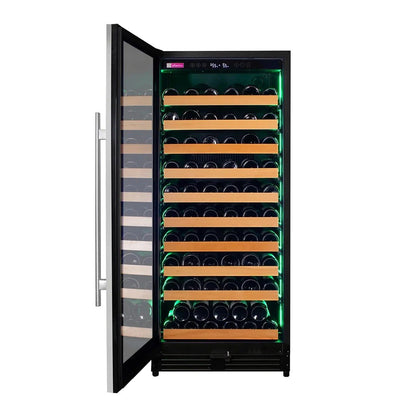 Wine cooler with open door displaying rows of wine bottles on wooden shelves.