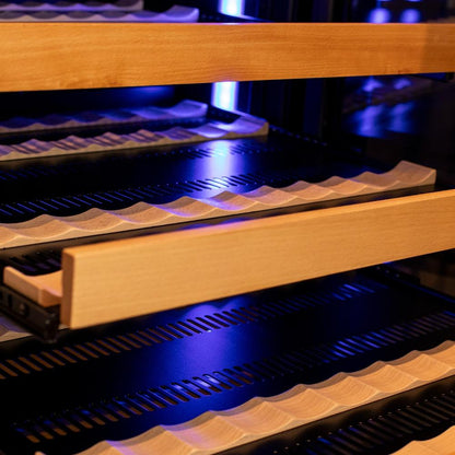 Wine cooler with wooden shelves and blue lighting